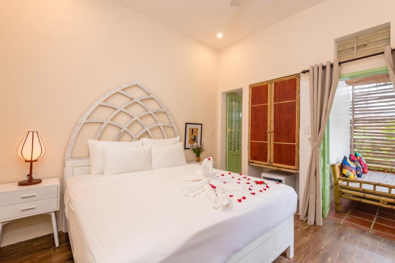 Wanderlust - Beach Side Hoi An An Bàn Εξωτερικό φωτογραφία