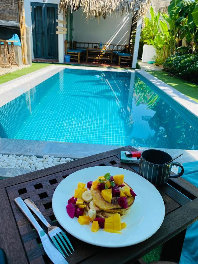 Wanderlust - Beach Side Hoi An An Bàn Εξωτερικό φωτογραφία